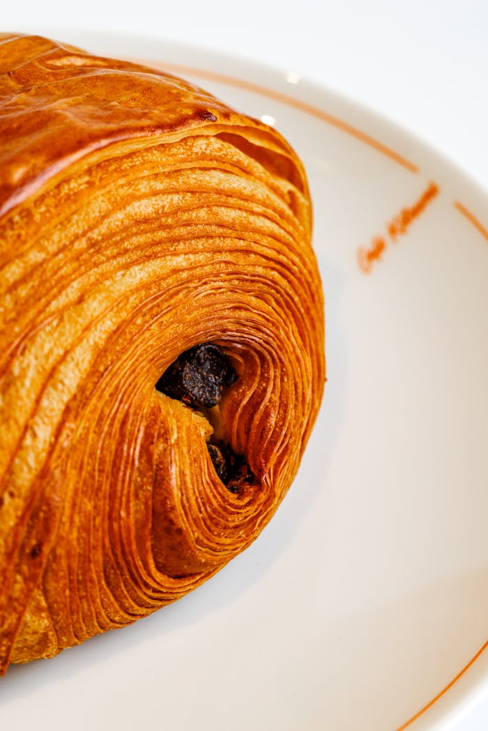 delicious-pain-au-chocolat-on-elegant-plate-32268778